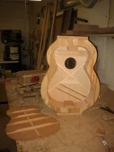 Man building guitars