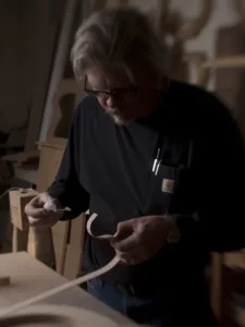 Man building guitars