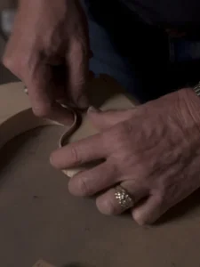Man building guitars